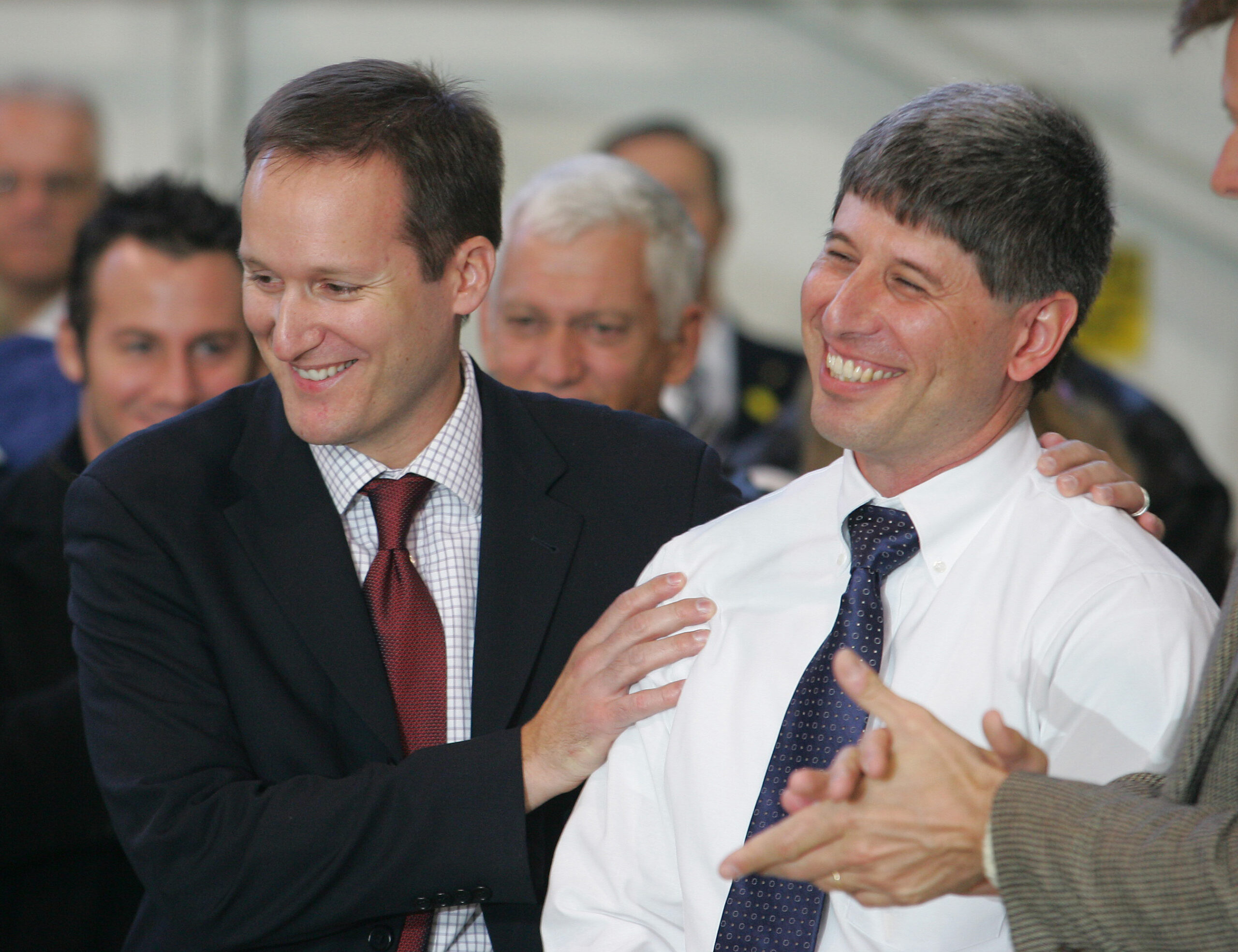 **FILE**Jan Paladino, left, and Joseph Lepore, both U.S. pilots who were detained in Brazil for more than two months following a midair collision that killed 154 people, are greeted by friends and family upon returning to Long Island MacArthur Airport in Ronkonkoma, N.Y, in this Dec. 9, 2006 file photo. Paladino and Lepore, indicted in June, 2007, by a Brazilian judge, are willing to testify in the case, but will not return next week to Brazil to do so, their American lawyer said Thursday, Aug. 23, 2007. (AP Photo/Ed Betz, File) (Ed Betz)