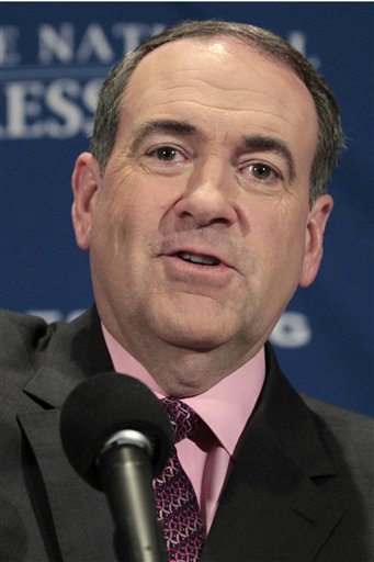 FILE - This Feb. 24, 2011 file photo shows former Arkansas Gov. Mike Huckabee in Washington. Huckabee's decision on whether to move toward another run for president -- which he'll announce on his television show Saturday night, May 14, 2011 -- may come down to whether he's willing to cut back those revenue streams to put his political career first again. His top advisers say he hasn't told them what he'll do, which makes them think he's probably going to stick with the money, rather than go for the White House.    (AP Photo/Alex Brandon, File) (AP)