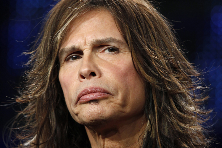 Judge Steven Tyler takes part in a panel discussion for the show "American Idol" at the Fox Broadcasting Company Winter Press Tour 2011 for the Television Critics Association in Pasadena, California January 11, 2011.  REUTERS/Lucy Nicholson (UNITED STATES - Tags: ENTERTAINMENT HEADSHOT) (Â© Lucy Nicholson / Reuters)