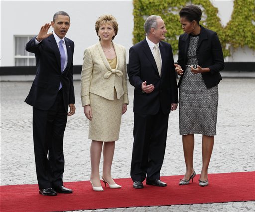 From left, President Barack Obama, President of Ireland Mary McAleese and her husband Martin McAleese, and first lady Michelle Obama stop to be photographed as President Barack Obama arrives at the Presidential Residence in Dublin, Ireland, Monday, May 23, 2011. President Barack Obama opens a six-day European tour with a quick dash through Ireland, where he will celebrate his own Irish roots and look to give a boost to a nation grappling with the fallout from its financial collapse.(AP Photo/Carolyn Kaster) (AP)