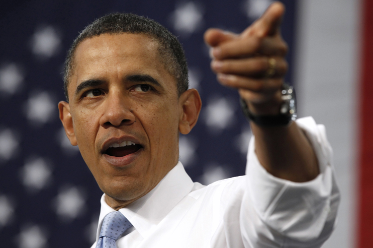 U.S. President Barack Obama gestures as he speaks to a worker after touring the Allison Hybrid Transmission headquarters in Indianapolis, Indiana May 6, 2011. REUTERS/Kevin Lamarque  (UNITED STATES - Tags: POLITICS HEADSHOT) (Â© Kevin Lamarque / Reuters)