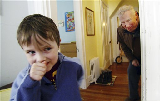 In this January 2011 still photo taken from video, PBS newsman Robert MacNeil, right, interacts with Nick, his 6-year-old grandson, at Nick's family's home in Cambridge, Mass.  After a decade off the air, MacNeil returns  Monday, April 18, 2011, with a six-part series he reported on autism, inspired by Nick, who is featured in the series. (AP Photo/PBS NewsHour) (AP)