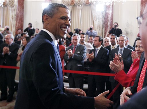 President Barack Obama shakes hands with audience members after he delivered his Middle East speech at the State Department in Washington, Thursday, May 19, 2011. (AP Photo/Charles Dharapak) (AP)