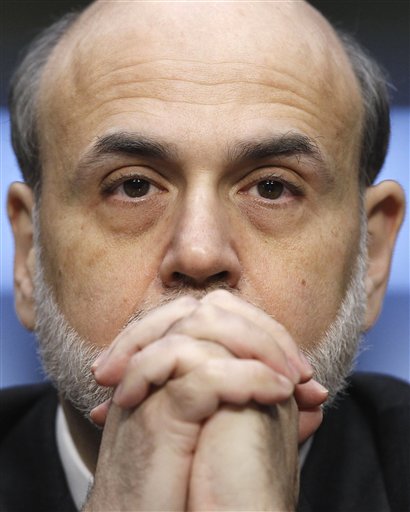 FILE - In his March 1, 2011 file photo, Federal Reserve Chairman Ben Bernanke tetsifies on Capitol Hill in Washington, before the Senate Banking Committee. The United States has never defaulted on its debt and leaders from both parties say they dont want it to happen now. But with partisan acrimony running at fever pitch, and Democrats and Republicans far apart on how to tame the deficit, anything could happen. (AP Photo/Alex Brandon, File) (AP)