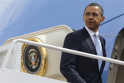 President Barack Obama boards Air Force One at Andrews Air Force Base, Md., Tuesday, May 10, 2011, as he travels to the U.S.-Mexico border at El Paso, Texas, to speak about immigration reform, Tuesday, May 10, 2011. (AP Photo/Charles Dharapak) (AP)