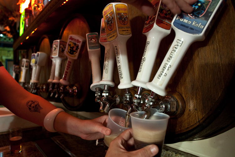 Beer being poured during a tour of Sprecher Brewery in Glendale, Wis.