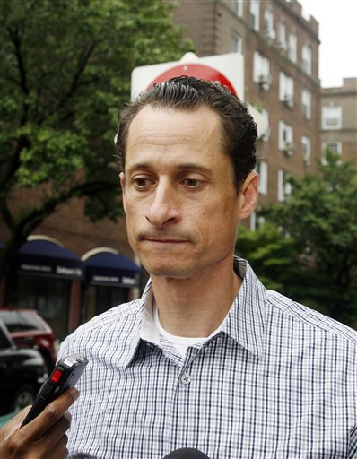 Rep. Anthony Weiner, D-N.Y., answers questions from the media as he carries his laundry to a laundromat near his home in the Queens borough of New York, Saturday, June  11, 2011. The 46-year-old congressman acknowledged Friday that he had online contact with a 17-year-old girl from Delaware but said there was nothing inappropriate. (AP Photo/David Karp) (AP)