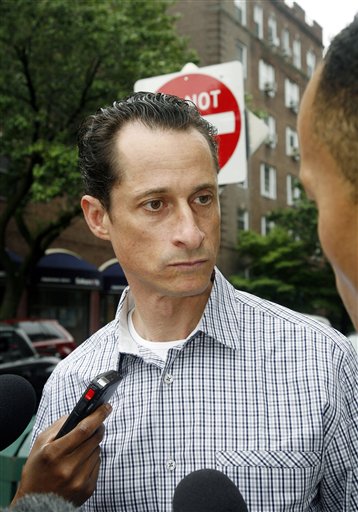 Rep. Anthony Weiner, D-N.Y., answers questions from the media as he carries his laundry to a laundromat near his home in the Queens borough of New York, Saturday, June  11, 2011. The 46-year-old congressman acknowledged Friday that he had online contact with a 17-year-old girl from Delaware but said there was nothing inappropriate. (AP Photo/David Karp) (AP)