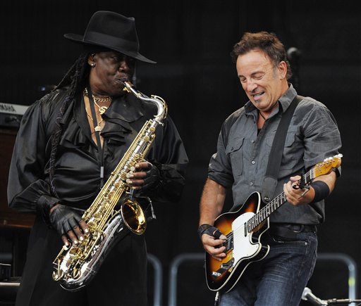 FILE - In this July 2, 2009 file photo, U.S. rock singer Bruce Springsteen, right, and saxophonist Clarence Clemons  perform during the first German concert of his "Working On A Dream" European tour in the Olympic stadium in Munich, Germany.  A person who has worked with Clemons in the past confirmed Sunday night, June 12, 2011 that Clemons has suffered a stroke. (AP Photo/Christof Stache, File) (AP)