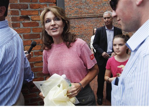 Former Alaska Gov. Sarah Palin, accompanied by her youngest daughter Piper, right, tours Boston's North End neighborhood, Thursday, June 2, 2011. (AP Photo/Steven Senne) (AP)