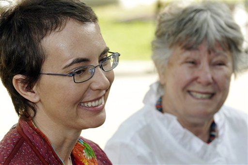 ADDS ADDITIONAL SOURCING INFORMATION - This most recent photo of U.S. Rep. Gabrielle Giffords since she was shot, was posted to her public Facebook page by her aides early Sunday, June 12, 2011.  The woman in the background is her mother Gloria Giffords. The photo was taken May 17, 2011 at TIRR Memorial Hermann Hospital in Houston, the day after the launch of space shuttle Endeavour and the day before she had her cranioplasty. Giffords could be released from a rehabilitation hospital in Houston sometime this month, a top aide says, offering the latest indication that the Arizona congresswoman is making progress in recovering from a gunshot wound to the head. (AP Photo/southwestphotobank.com, P.K. Weis) MANDATORY CREDIT (AP)