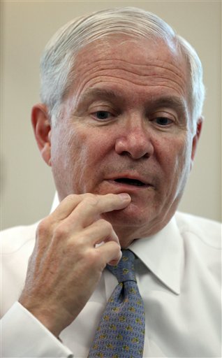 Secretary of Defense Robert Gates, speaks during an interview with The Associated Press in his office at the Pentagon Monday, June 13, 2011, in Washington. Gates says he sees no roadblocks to repeal of the ban on gay military members serving openly and says if the military chiefs make their recommendation to move forward on the repeal before the end of the month, he will sign it, which would make it effective as early as September. (AP)