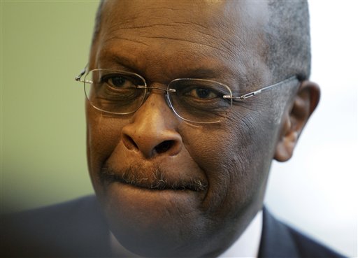 FILE - Former CEO of Godfather's Pizza Herman Cain is seen at the Iowa Faith and Freedom Coalition, in this March 7, 2011 file photo taken at the Point of Grace Church in Waukee, Iowa. The 65-year-old Cain will try to see if he can use grass-roots enthusiasm to turn a long-shot presidential campaign into a realistic bid. He plans to announce his candidacy at a rally in Atlanta on Saturday May 21, 2011. (AP Photo/Charlie Neibergall, File) (AP)