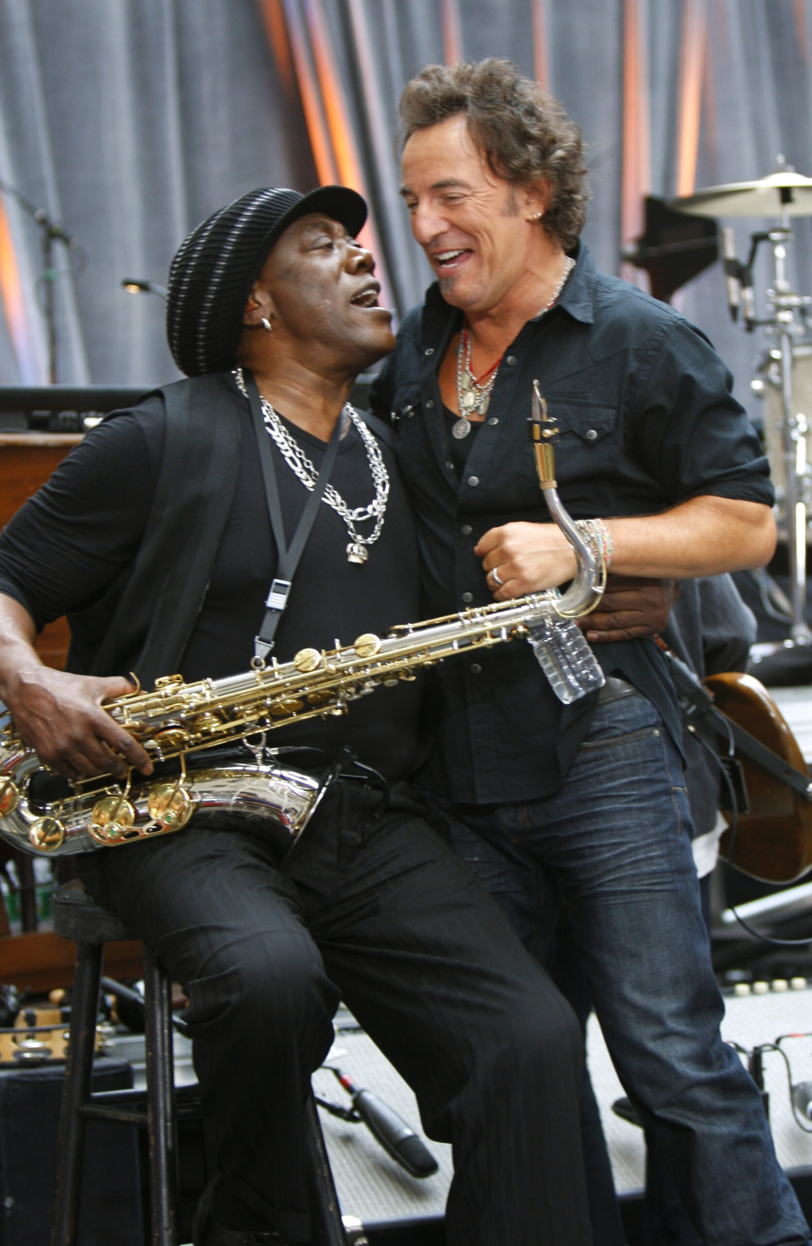 Musician Clarence Clemons (L) grabs Bruce Springsteen during an appearance with the E-Street band at the "Today" show in New York, September 28, 2007. The band's U.S. tour begins October 2, 2007 in Hartford, Connecticut.    REUTERS/Brendan McDermid (UNITED STATES) (Reuters)