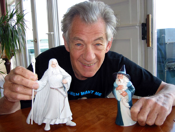 Ian McKellen plays with dolls.