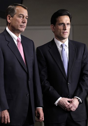 FILE -- In this file photo of Thursday, June 16, 2011, House Majority Leader Eric Cantor of Virginia, right, stands with House Speaker John Boehner of Ohio on Capitol Hill in Washington. Cantor, who has been participating in bipartisan budget talks headed by Vice President Joe Biden, pulled out today citing an impasse over taxes that required intervention by President Barack Obama and House Speaker John Boehner. (AP Photo/J. Scott Applewhite, File) (AP)