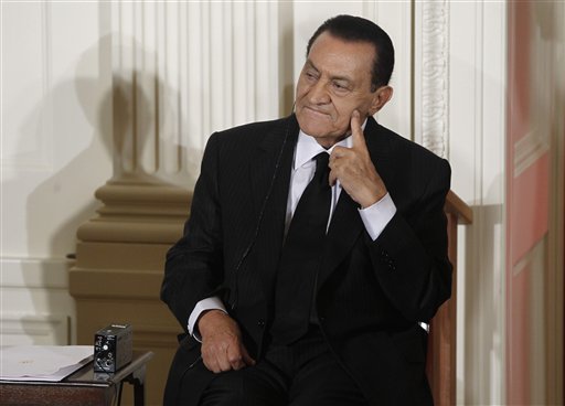 CORRECTS 2ND SENTENCE MUBARAK TO FACE TRIAL -- FILE - In this Wednesday, Sept. 1, 2010 file photo, Egypt's then President Hosni Mubarak listens as Israel's Prime Minister Benjamin Nethanyahu, unseen, speaks in the East Room of the White House in Washington. Hosni Mubarak will stand trial on charges of conspiring in the deadly shootings of protesters during the uprising that ousted him, the prosecutor-general said Tuesday, and in addition he and his two sons were charged with abusing power to amass wealth, enriching associates and accepting bribes - a major step in a country still rattled by protests and demands for justice.   (AP Photo/Charles Dharapak, File) (AP)