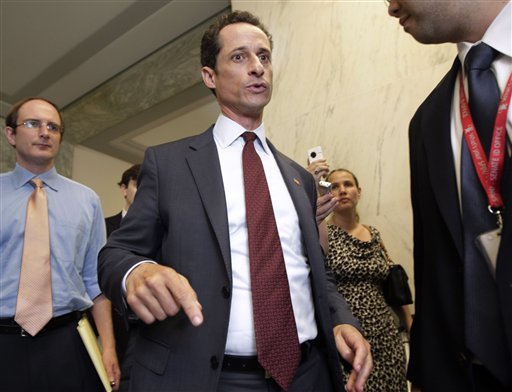 Rep. Anthony Weiner, D-N.Y. walks from his office to an elevator in the Rayburn House Office Building for a vote, on Capitol Hill in Washington, Wed., June 1, 2011. Weiner denied Wednesday sending a lewd photo from his Twitter account to a 21-year-old woman, trying to calm a media furor that has only increased by the day and wasn't put to rest by the combative lawmaker's latest comments.  (AP Photo/J. Scott Applewhite) (AP)