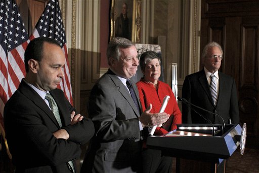 FILE - In this Dec. 8, 2010, file photo, Senate Majority Whip Richard Durbin of Ill., second from left, gestures during a news conference on Capitol Hill in Washington, to discuss the Dream Act legislation. From left are, Rep. Luis Gutierrez, D-Ill.,  Homeland Security Secretary Janet Napolitano, and Rep. Howard Berman, D-Calif. With a re-election campaign looming, President Barack Obama is pushing Congress to overhaul the immigration system, but lawmakers seems to have little appetite to take on the issue. (AP Photo/Harry Hamburg) (AP)