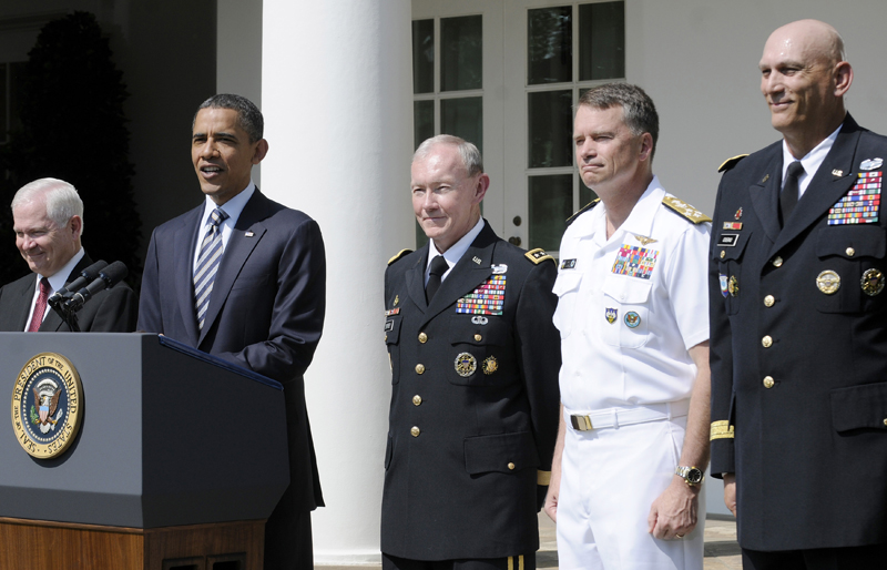 U.S. President Barack Obama (from 2nd L-R) smiles as he names U.S. Army General Martin Dempsey his pick to be the next chairman of the Joint Chiefs of Staff, U.S. Navy Admiral Sandy Winnefeld to be the new vice chairman of the Joint Chiefs, and General Ray Odierno to be the new Chief of Staff of the Army in an announcement in the Rose Garden at the White House in Washington, May 30, 2011. Also pictured is Defense Secretary Robert Gates (L).  REUTERS/Jonathan Ernst   (UNITED STATES - Tags: POLITICS MILITARY) (Â© Jonathan Ernst / Reuters)