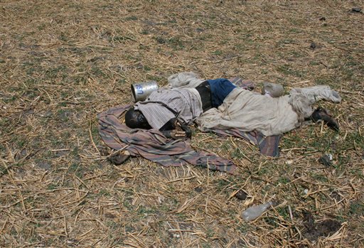 In this photo obtained by the Associated Press on Thursday June 2, 2011 and taken on May 8, 2011, a man, who according U.N. reports had been killed in a apparent massacre of civilians, lies on the ground in the village of Kaldak, Jonglei state, southern Sudan. Southern Sudan soldiers attacking a minority ethnic group targeted and shot unarmed men and women after a battle at this remote Nile River village that resulted in hundreds of civilian victims, according to secret U.N. reports obtained by The Associated Press. The killings including of women and young children,  raise serious questions over how much control Southern Sudan's military leaders have over troops in the field as the south approaches its independence day July 9, when it officially breaks away from northern Sudan and becomes the world's newest nation. (AP Photo) (AP)