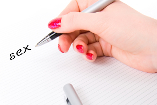 Woman hand with pen and paper. (Stas)