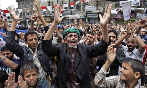 Anti-government protestors, chant slogans during a demonstration demanding the resignation of Yemeni President Ali Abdullah Saleh, in Sanaa, Yemen, Sunday, June 12, 2011. (AP Photo/Hani Mohammed) (AP)