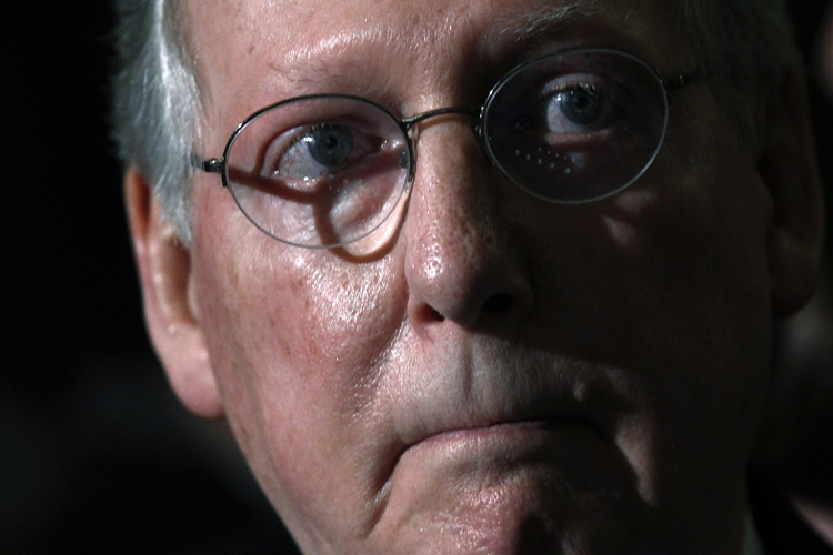 U.S. Senate Minority leader Mitch McConnell (R-KY) listens during remarks about leadership elections on Capitol Hill in Washington, November 16, 2010.   REUTERS/Jim Young   (UNITED STATES - Tags: POLITICS) (Â© Jim Young / Reuters)