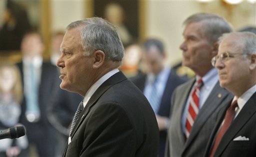 Gov. Nathan Deal  speaks at a  news conference, as former Attorney General Mike Bowers and Dekalb County DA Bob Wilson, right, listen,  on Tuesday, July 5, 2011 in Atlanta.  A probe has found that more than 78 percent of Atlanta schools examined by state investigators engaged in cheating on standardized tests.  Deal said 44 of the 56 schools investigated took part in cheating. Investigators also found that 38 principals were wither responsible for the cheating or were directly involved in it. And they determined that 178 teachers and principals cheated. Of those, 82 confessed to the misconduct.  (AP Photo/Atlanta Journal & Constitution, Bob Andres) (AP)