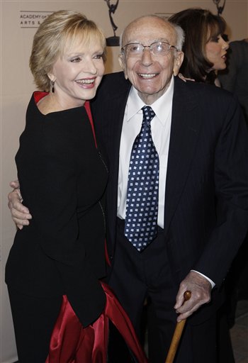 FILE - In this Dec. 9, 2008 file photo, Hall of Fame inductee Sherwood Schwartz, right, and actress Florence Henderson pose together at the Academy of Television Arts and Sciences 2008 Hall of Fame Ceremony in Beverly Hills, Calif. Schwartz, who created "Gilligan's Island" and "The Brady Bunch" died Tuesday, July 12, 2011. He was 94.  (AP Photo/Matt Sayles, file) (AP)