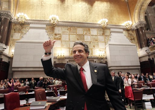 New York Gov. Andrew Cuomo reacts after same-sex marriage is legalized after a vote in the state Senate on June 24.