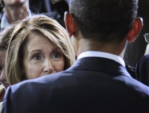 President Barack Obama speaks with House Minority Leader Nancy Pelosi of Calif.,  at the Washington Convention Center in Washington, Friday, July 29, 2011, after delivering remarks on improved Fuel Efficiency Standards for cars and light trucks. (AP Photo/Pablo Martinez Monsivais) (AP)