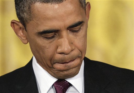 President Barack Obama pauses before answering a question during a news conference in the East Room of the White House in Washington, Wednesday, June 29, 2011. (AP Photo/Carolyn Kaster) (AP)