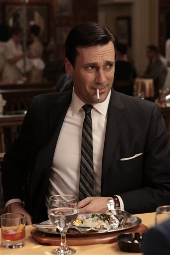 In this publicity image released by AMC, Jon Hamm portrays Don Draper in the AMC series, "Mad Men." The series was nominated for an Emmy for best drama series, and Jon Hamm was nominated for best actor in a drama series on Thursday, July 14, 2011. The Emmy awards will be presented on Sept. 18. (AP Photo/AMC) (AP)