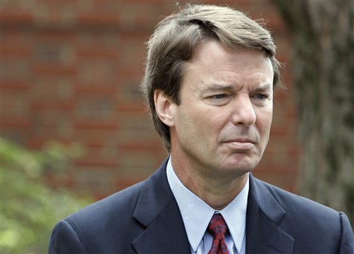 FILE - In this March 22, 2007, file photo Democratic presidential hopeful John Edwards listens to his wife Elizabeth, not shown, talk to media about her recurrence of cancer during a news conference in Chapel Hill, N.C. The legal case against two-time presidential candidate focuses on where to draw the line between the public and private in a politician's life. The central dispute over Edwards' indictment on felony charges is whether money, spent by two supporters to keep his mistress in hiding, were campaign contributions or private gifts from friends. (AP Photo/Gerry Broome, File) (AP)