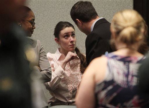 Casey Anthony talks with a supporter in court following the end of her  murder trial where she was acquitted of murder charges in  Orlando, Fla. Tuesday, July 5, 2011. Anthony had been charged with killing her daughter, Caylee.  (AP Photo/Red Huber, Pool) (AP)