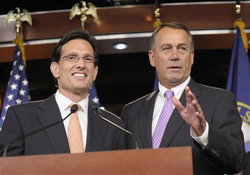 House Speaker John Boehner of Ohio, right, stands with House Majority Leader Eric Cantor of Va., during a news conference on Capitol Hill in Washington, Thursday, July 14, 2011. (AP Photo/Susan Walsh) (AP)