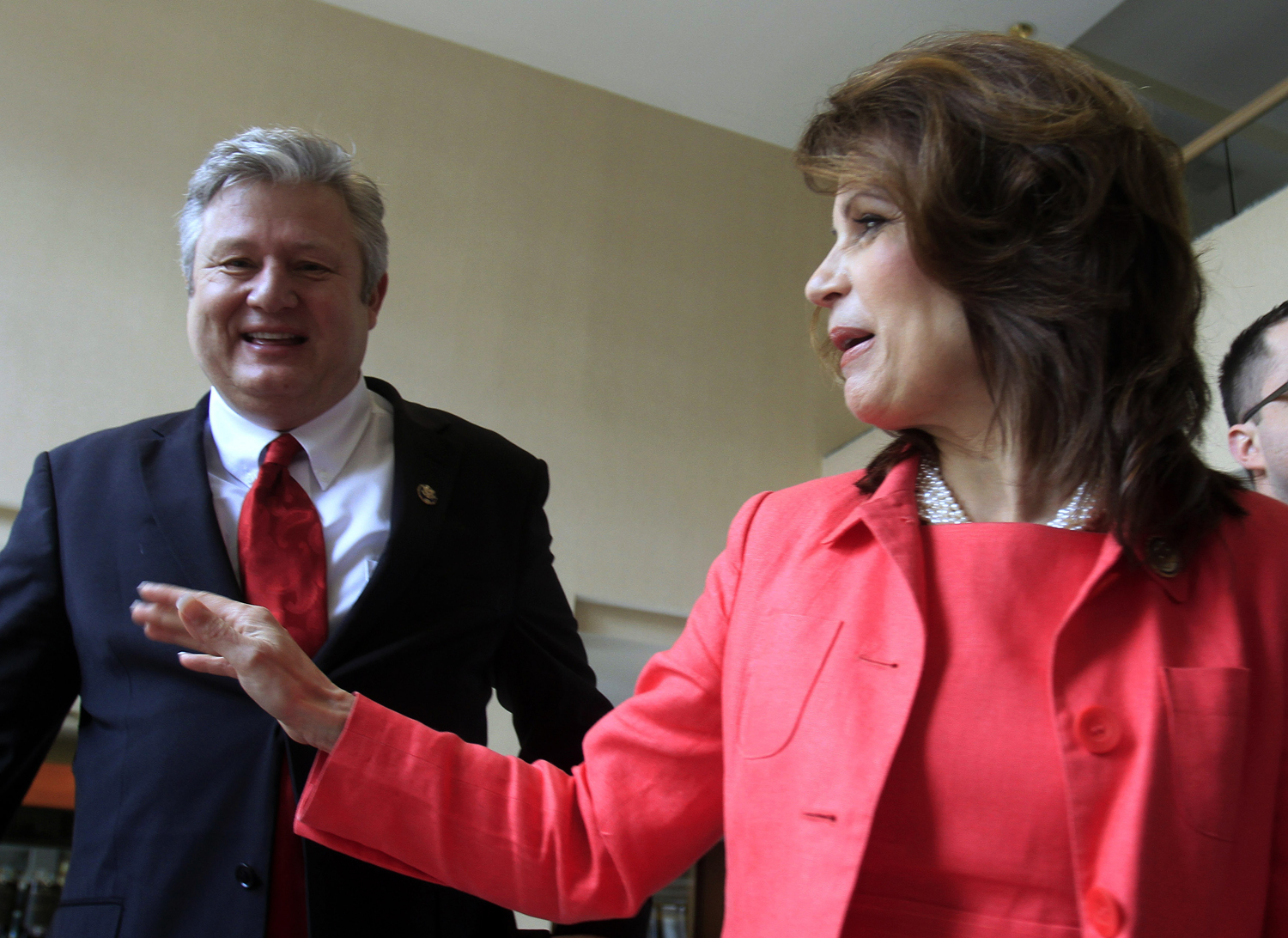 U.S. Rep. Michele Bachmann, R-Minn., arrives with her husband, Marcus, to a state GOP fundraiser Saturday, March 12, 2011 in Nashua, N.H. Bachmann recently has visited two other early nominating states and is expected to announce whether she's running for a Republican presidential nomination by early summer. (AP Photo/Jim Cole) (Jim Cole)