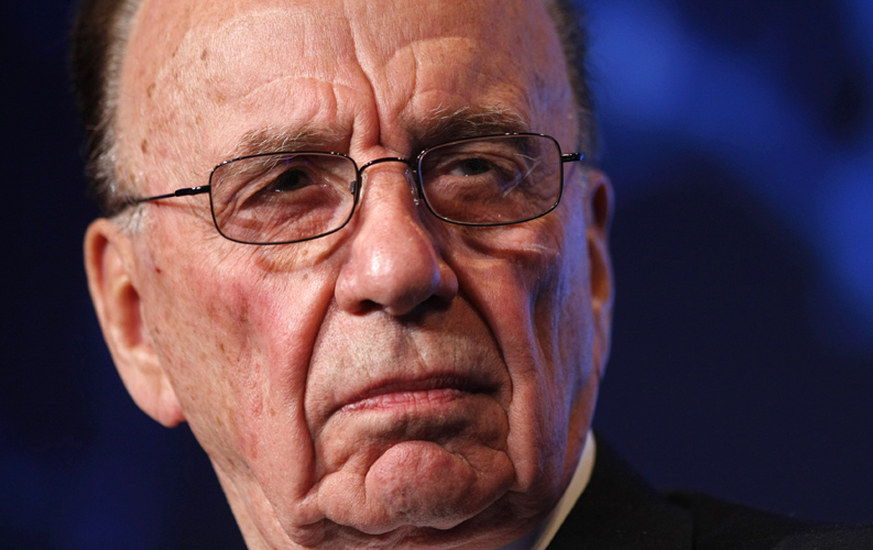 News Corporation Chairman and CEO Rupert Murdoch listens to remarks while participating in the Wall St. Journal CEO Council on "Rebuilding Global Prosperity" in Washington November 16, 2009. Financially, owning both high and low-brow publications makes sense -- although newspapers made up only 19 percent of News Corp's revenues of $32.8 billion in 2010. In Britain, Murdoch's tabloids subsidise The Times, which has an average daily circulation of just under half a million -- about double the readership when he bought it - but is loss-making. Picture taken November 16, 2009.    To match Special Report NEWSCORP/TAINT     REUTERS/Kevin Lamarque/Files    (UNITED STATES  - Tags: BUSINESS MEDIA HEADSHOT) (Â© Kevin Lamarque / Reuters)