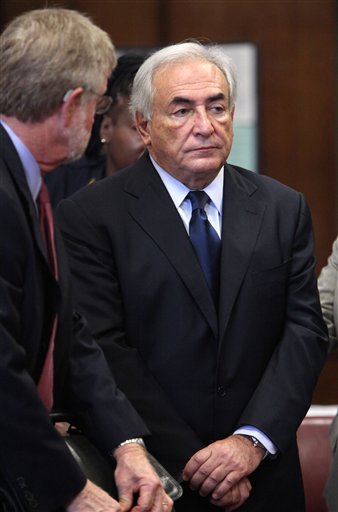 FILE - In this Monday, June 6, 2011 file photo, former IMF leader Dominique Strauss-Kahn, right, appears at his arraignment on charges of sexually assaulting a Manhattan hotel maid, at State Supreme Court in New York. Attorney William Taylor is at left.  A person familiar with the case says former International Monetary Fund Leader Dominique Strauss-Kahn will have his bail substantially reduced in his sexual assault case because of issues with his accuser's credibility, Thursday, June 30, 2011.  (AP Photo/Allan Tannenbaum, Pool, File) (AP)