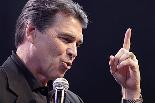 In this Sunday, June 12, 2011 photo, Texas Gov. Rick Perry speaks during a United For Life event event organized by a Hispanic anti-abortion group at the Los Angeles Memorial Sports Arena in Los Angeles. (AP Photo/Richard Vogel) (Richard Vogel)