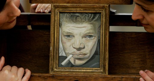 FILE In this Oct. 29, 2007 photo, people look at a painting by Lucian Freud entitled, '"Boy Smoking ", dated 1951-2., part of the Simon Sainsbury Bequest unveiled at the Tate Britain gallery in London.  Lucian Freud, a towering and uncompromising figure in the art world for more than 50 years, had died after an illness, his New York-based art dealer said Thursday, July 21, 2011.  He was 88.  (AP Photo/Alastair Grant) (AP)