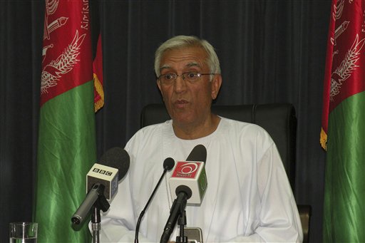 In this undated image made available by the provincial media center Kandahar Mayor Ghulam Haider Hamidi addresses a press conference in Kandahar south of Kabul, Afghanistan. The mayor of Kandahar was assassinated on Wednesday July 27, 2011 by a suicide bomber who hid explosives in his turban Afghan officials said. The Taliban say they sent the suicide bomber who killed the mayor of Kandahar in southern Afghanistan. Hamidi was the third major powerbroker from the south to be slain this month. (AP Photo/Provincial Media Center ) (AP)