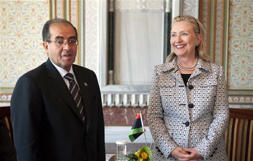 U.S Secretary of State Hillary Rodham Clinton reacts with Mahmud Jibril, Chairman of the Libyan Interim National Transitional Council, during the fourth Libya Contact Group Meeting in Istanbul, Friday, July 15, 2011. Around 15 top diplomats including US Secretary of State Hillary Rodham Clinton are to meet in Istanbul to discuss a political solution to the conflict in Libya while co-ordinating aid for the rebels. (AP Photo/Saul Loeb, Pool) (AP)