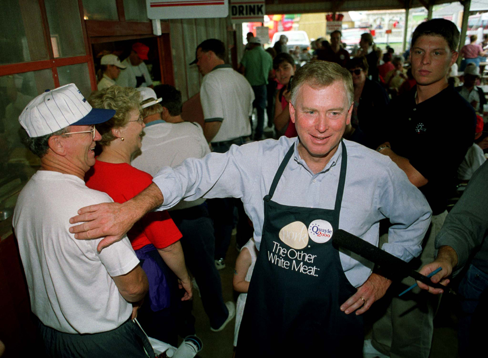 Republican presidential hopeful Dan Quayle greets people at the Iowa State Fair while campaigning August 12 in Des Moines. Presidential hopefuls from both parties are criss-crossing Iowa campaigning before the annual Iowa Straw Poll on August 14.

JM/TB (Â© Reuters Photographer / Reuters)