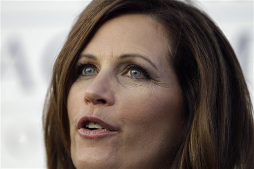Republican presidential candidate Rep. Michele Bachmann, R-Minn., speaks outside her campaign bus after the Black Hawk County Republican Lincoln Day Dinner, Sunday, Aug. 14, 2011, in Waterloo, Iowa. (AP Photo/Charlie Neibergall) (AP)