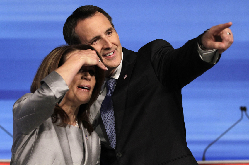 Republican presidential candidates Rep. Michele Bachmann, R-Minn., left, and former Minnesota Governor Tim Pawlentylook to the audience before the start of the Iowa GOP/Fox News Debate at the CY Stephens Auditorium in Ames, Iowa, Thursday, Aug. 11, 2011. (AP Photo/Charlie Neibergall) (Charlie Neibergall)