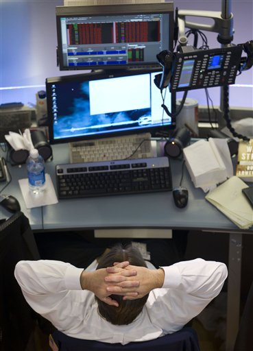 A trader works on the floor of the New York Stock Exchange before close on Monday, Aug. 8, 2011 in New York. The Dow Jones industrials closed down 634 points, or 5.5 percent, to 10,809 Monday. It was the first time the Dow fell below 11,000 since November and its biggest one-day point drop since December 2008. (AP Photo/Jin Lee) (AP)