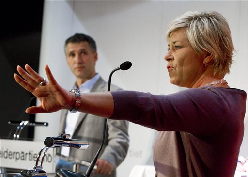 FILE -  In this Sunday Sept. 14, 2009 file photo Siv Jensen, leader of Norwegian Progress Party, right, speaks during a last pre-election debate watched by Norway's Prime Minister and leader of the Norwegian Labour Party, Jens Stoltenberg in Oslo, Norway. The leader of Norway's right-wing Progress Party calls former member Anders Behring Breivik's anti-Muslim views "perversely unique" and not in any way linked to her party. Jensen told AP on Tuesday Aug. 2, 2011 he kept a low profile and never revealed his murderous plans: "It was impossible for us to forsee at the time. He obviously changed in recent years without anyone knowing."  She resents being linked to Breivik's views, noting he condems "all political parties in Norway, mine included, because he feels that we are all responsible for what he feels is the wrong development of Norway and Europe." (AP Photo Heiko Junge / Scanpix Norway) ** NORWAY OUT ** (Associated Press)