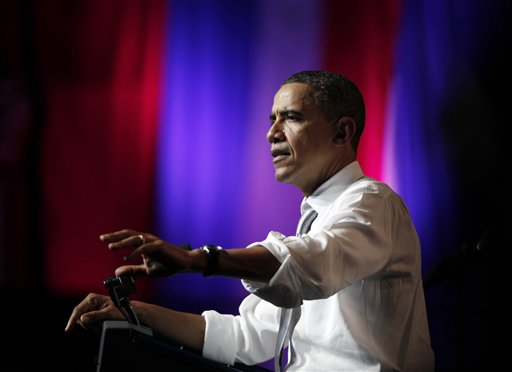President Barack Obama pauses as he speaks at the Aragon Ballroom, Wednesday, Aug. 3, 2011, in Chicago, in Chicago, at a fundraiser on the eve of his 50th birthday. (AP Photo/Carolyn Kaster) (AP)